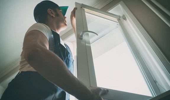 Technician installing new Windows in Pekin IL