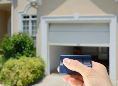 A Garage Door in Peoria IL being opened by a remote