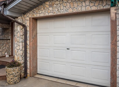 A white, residential Garage Door in Peoria IL