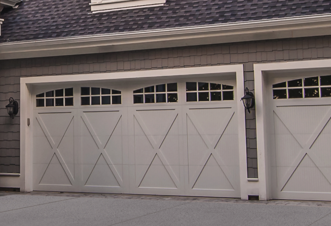 A set of white CHI garage doors in East Peoria IL