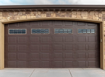 A new brown garage door after Garage Door Installation in Dunlap IL 